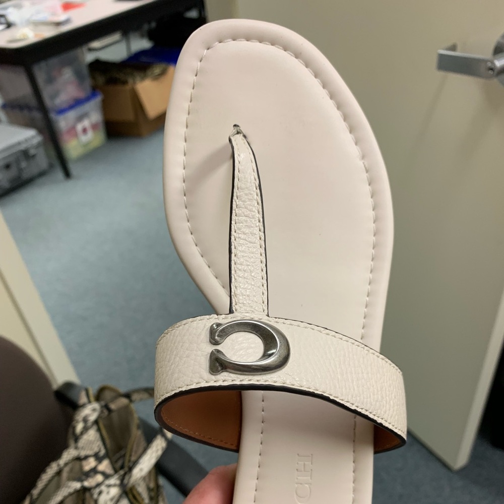 Coach slip on sandals. Practically brand new wore once. Very comfortable.